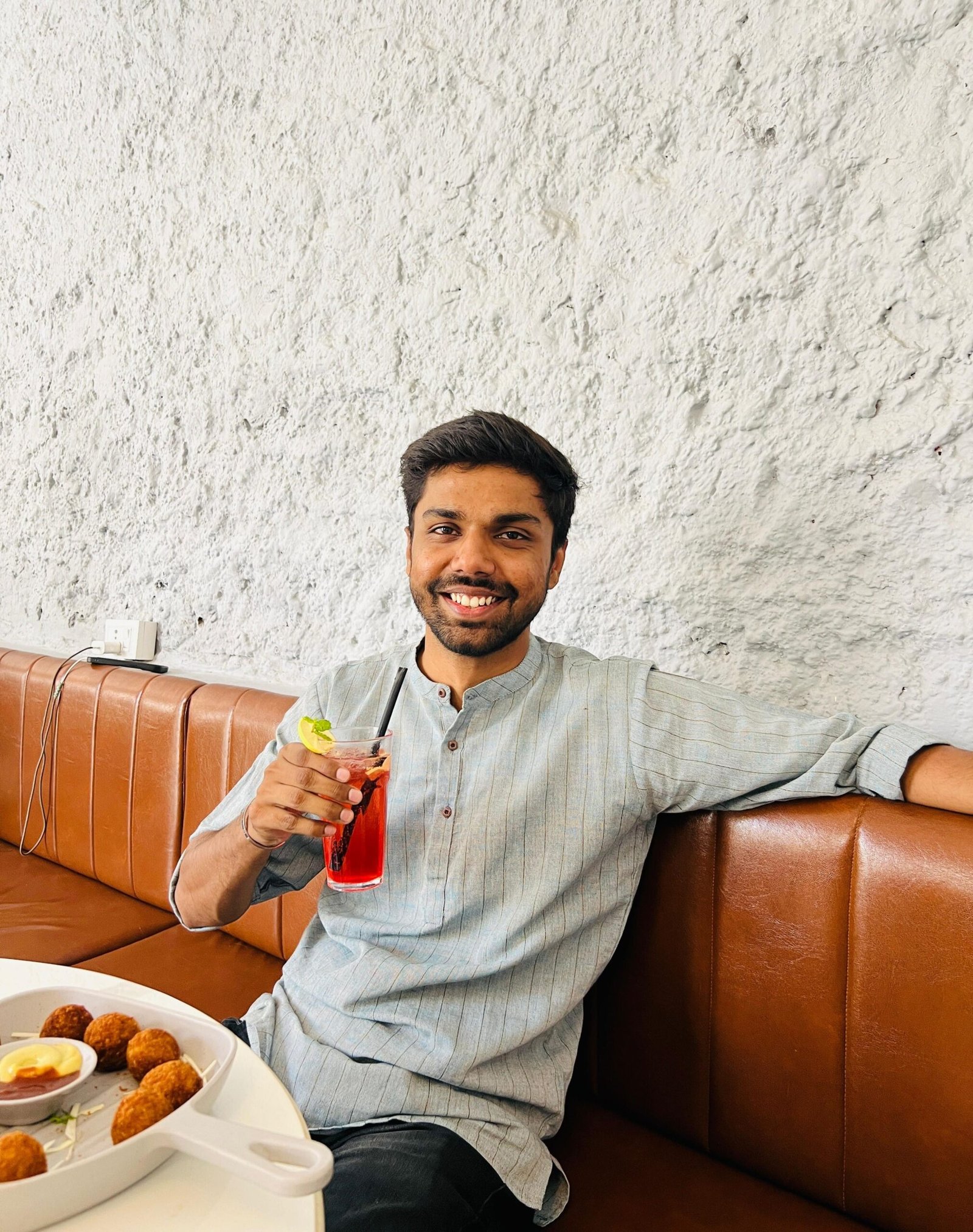 Rohitashav Sharma at a cafe having Mocktail